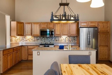 This home reflects a deep appreciation for quality and comfort on Cedar River Golf Course in Michigan - for sale on GolfHomes.com, golf home, golf lot