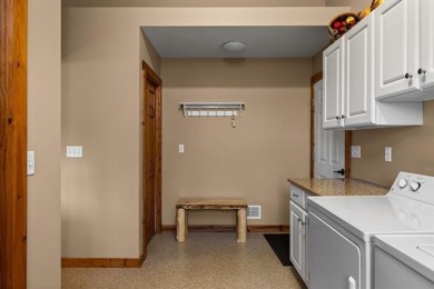 This home reflects a deep appreciation for quality and comfort on Cedar River Golf Course in Michigan - for sale on GolfHomes.com, golf home, golf lot