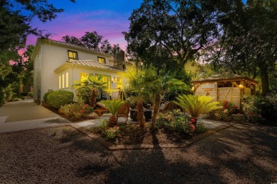 Nostalgic Myrtle Beach Cottage with Modern Upgrades  Step back on Whispering Pines in South Carolina - for sale on GolfHomes.com, golf home, golf lot