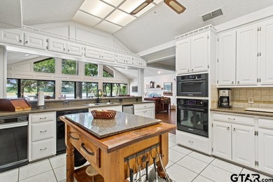 Enjoy breathtaking lake views from nearly every room in this on Hide-A-Way Lake Golf Course in Texas - for sale on GolfHomes.com, golf home, golf lot