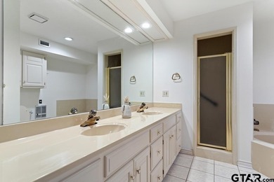 Enjoy breathtaking lake views from nearly every room in this on Hide-A-Way Lake Golf Course in Texas - for sale on GolfHomes.com, golf home, golf lot