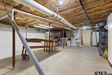 Enjoy breathtaking lake views from nearly every room in this on Hide-A-Way Lake Golf Course in Texas - for sale on GolfHomes.com, golf home, golf lot