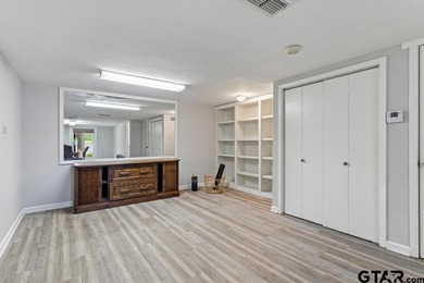 Enjoy breathtaking lake views from nearly every room in this on Hide-A-Way Lake Golf Course in Texas - for sale on GolfHomes.com, golf home, golf lot