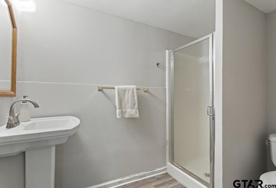 Enjoy breathtaking lake views from nearly every room in this on Hide-A-Way Lake Golf Course in Texas - for sale on GolfHomes.com, golf home, golf lot