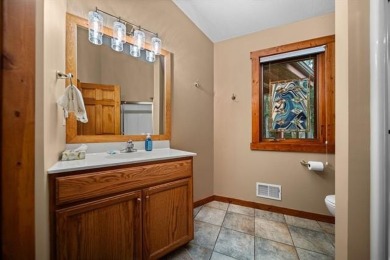 This home reflects a deep appreciation for quality and comfort on Cedar River Golf Course in Michigan - for sale on GolfHomes.com, golf home, golf lot