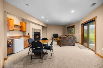 This home reflects a deep appreciation for quality and comfort on Cedar River Golf Course in Michigan - for sale on GolfHomes.com, golf home, golf lot