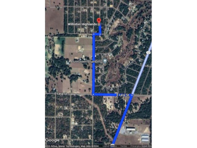 1/4 acre wooded building lot in Williston Hylands Golf and on Williston Highlands Golf and Country Club in Florida - for sale on GolfHomes.com, golf home, golf lot