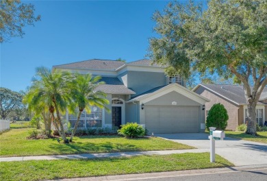 Nestled within the sought-after guard-gated Eagles Golf on The Eagles Golf Course and Club in Florida - for sale on GolfHomes.com, golf home, golf lot