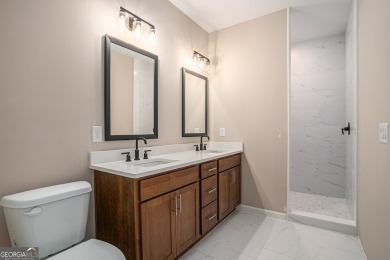 This modern farmhouse ranch-style home is situated right on the on Cabin Creek Golf Club in Georgia - for sale on GolfHomes.com, golf home, golf lot
