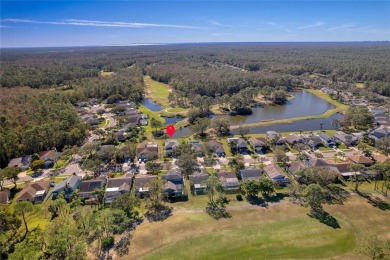 Nestled within the sought-after guard-gated Eagles Golf on The Eagles Golf Course and Club in Florida - for sale on GolfHomes.com, golf home, golf lot