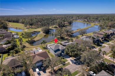 Nestled within the sought-after guard-gated Eagles Golf on The Eagles Golf Course and Club in Florida - for sale on GolfHomes.com, golf home, golf lot