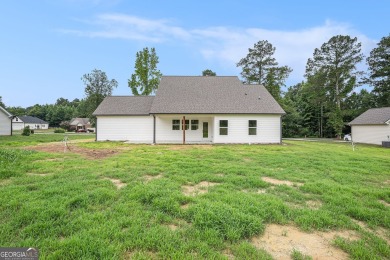 This modern farmhouse ranch-style home is situated right on the on Cabin Creek Golf Club in Georgia - for sale on GolfHomes.com, golf home, golf lot