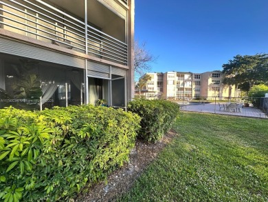 RARELY AVAILABLE 1st Floor Corner Unit on the prestigious Pine on Pine Island Ridge Country Club in Florida - for sale on GolfHomes.com, golf home, golf lot