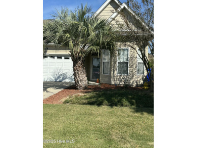 A three-bedroom, three-bathroom townhome located on the par on South Harbour Golf Links in North Carolina - for sale on GolfHomes.com, golf home, golf lot