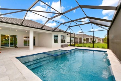 One or more photo(s) has been virtually staged. If you're on Esplanade Golf and Country at Lakewood Ranch in Florida - for sale on GolfHomes.com, golf home, golf lot