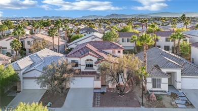 This gorgeous home located in guard gated Rhodes Ranch features on Rhodes Ranch Golf Club in Nevada - for sale on GolfHomes.com, golf home, golf lot