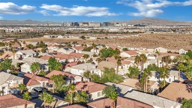 This gorgeous home located in guard gated Rhodes Ranch features on Rhodes Ranch Golf Club in Nevada - for sale on GolfHomes.com, golf home, golf lot