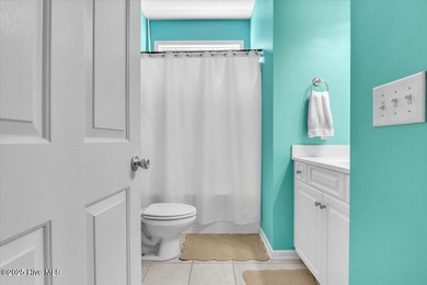 A three-bedroom, two-bathroom townhome located on the par three on South Harbour Golf Links in North Carolina - for sale on GolfHomes.com, golf home, golf lot