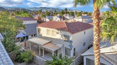 This gorgeous home located in guard gated Rhodes Ranch features on Rhodes Ranch Golf Club in Nevada - for sale on GolfHomes.com, golf home, golf lot