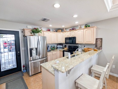 Located in an exclusive gated community with a championship on The Great Outdoors Golf and Country Club in Florida - for sale on GolfHomes.com, golf home, golf lot