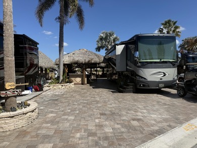 Beautiful landscaped lot that backs to golf course. Waterfall on St. Lucie Trail Golf Club in Florida - for sale on GolfHomes.com, golf home, golf lot