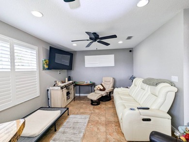 Located in an exclusive gated community with a championship on The Great Outdoors Golf and Country Club in Florida - for sale on GolfHomes.com, golf home, golf lot