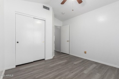 Tucked away in a charming cul-de-sac, this delightful 2-bedroom on Coyote Lakes Golf Club in Arizona - for sale on GolfHomes.com, golf home, golf lot