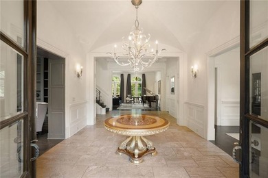 Stunning European-style home on over 1.7 acres of private on Bobby Jones Golf Club in Georgia - for sale on GolfHomes.com, golf home, golf lot