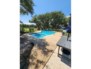 Turnkey downstairs unit in Rockport Country Club - fully on Rockport Country Club in Texas - for sale on GolfHomes.com, golf home, golf lot