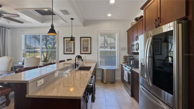 Come tour this exceptionally renovated 2 story courtyard home on Reunion Resort Golf Course in Florida - for sale on GolfHomes.com, golf home, golf lot