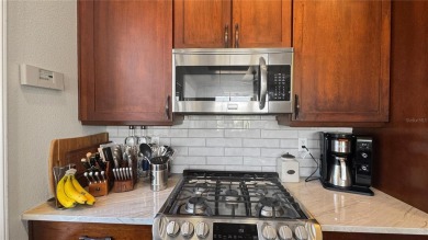 Come tour this exceptionally renovated 2 story courtyard home on Reunion Resort Golf Course in Florida - for sale on GolfHomes.com, golf home, golf lot