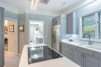 Tucked away on a quiet cul-de-sac street in the Oyster Reef area on Oyster Reef Golf Course in South Carolina - for sale on GolfHomes.com, golf home, golf lot
