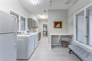 Tucked away on a quiet cul-de-sac street in the Oyster Reef area on Oyster Reef Golf Course in South Carolina - for sale on GolfHomes.com, golf home, golf lot