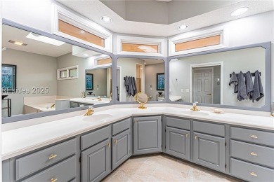 Tucked away on a quiet cul-de-sac street in the Oyster Reef area on Oyster Reef Golf Course in South Carolina - for sale on GolfHomes.com, golf home, golf lot