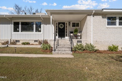 Elevated one-level living in this updated brick home on the golf on Wilson Country Club in North Carolina - for sale on GolfHomes.com, golf home, golf lot