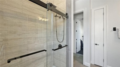 Come tour this exceptionally renovated 2 story courtyard home on Reunion Resort Golf Course in Florida - for sale on GolfHomes.com, golf home, golf lot