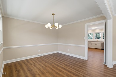 Elevated one-level living in this updated brick home on the golf on Wilson Country Club in North Carolina - for sale on GolfHomes.com, golf home, golf lot