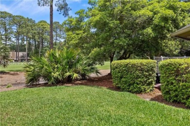 Tucked away on a quiet cul-de-sac street in the Oyster Reef area on Oyster Reef Golf Course in South Carolina - for sale on GolfHomes.com, golf home, golf lot