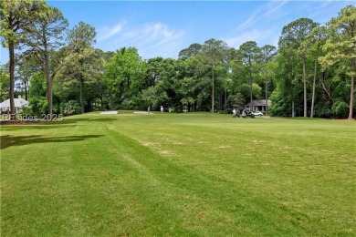 Tucked away on a quiet cul-de-sac street in the Oyster Reef area on Oyster Reef Golf Course in South Carolina - for sale on GolfHomes.com, golf home, golf lot
