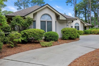 Tucked away on a quiet cul-de-sac street in the Oyster Reef area on Oyster Reef Golf Course in South Carolina - for sale on GolfHomes.com, golf home, golf lot