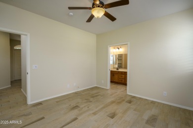 Welcome to this cozy unit with warm welcoming wood finished tile on Sunland Springs Golf Course  in Arizona - for sale on GolfHomes.com, golf home, golf lot