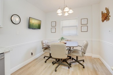 WELCOME TO THIS SPACIOUS, ATTRACTIVE CORNER, TOP FLOOR  CONDO on Poinciana Golf Club in Florida - for sale on GolfHomes.com, golf home, golf lot