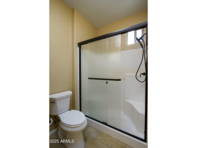 Welcome to this cozy unit with warm welcoming wood finished tile on Sunland Springs Golf Course  in Arizona - for sale on GolfHomes.com, golf home, golf lot