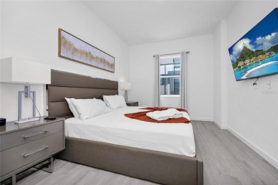This beautifully designed 4-bedroom, 4-bathroom townhouse plus a on Reunion Resort Golf Course in Florida - for sale on GolfHomes.com, golf home, golf lot