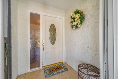 This updated home offers one of the most stunning views in all on Highland Lakes Executive Golf Course in Florida - for sale on GolfHomes.com, golf home, golf lot