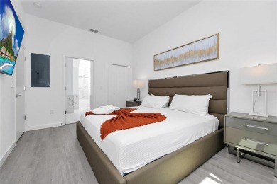 This beautifully designed 4-bedroom, 4-bathroom townhouse plus a on Reunion Resort Golf Course in Florida - for sale on GolfHomes.com, golf home, golf lot