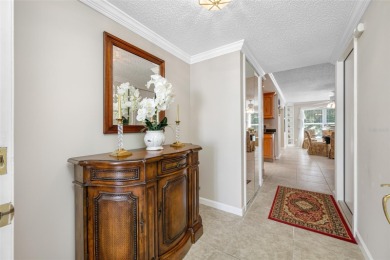 This updated home offers one of the most stunning views in all on Highland Lakes Executive Golf Course in Florida - for sale on GolfHomes.com, golf home, golf lot