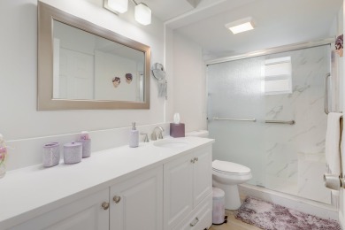 WELCOME TO THIS SPACIOUS, ATTRACTIVE CORNER, TOP FLOOR  CONDO on Poinciana Golf Club in Florida - for sale on GolfHomes.com, golf home, golf lot