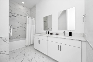This beautifully designed 4-bedroom, 4-bathroom townhouse plus a on Reunion Resort Golf Course in Florida - for sale on GolfHomes.com, golf home, golf lot