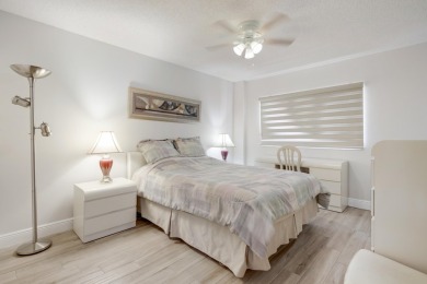 WELCOME TO THIS SPACIOUS, ATTRACTIVE CORNER, TOP FLOOR  CONDO on Poinciana Golf Club in Florida - for sale on GolfHomes.com, golf home, golf lot